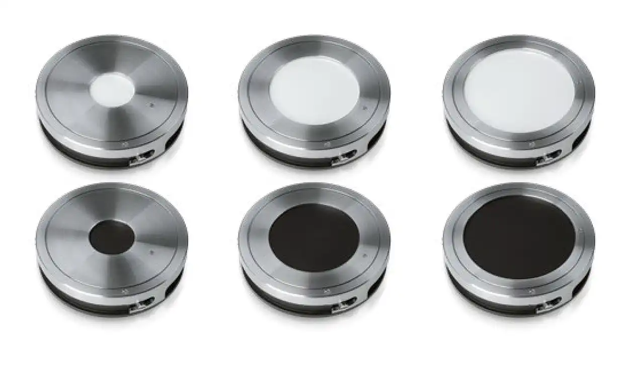 Circular sample holders with white and black backgrounds for filter membranes with diameters of 25 mm (left), 47 mm (middle), and 55 mm (right).